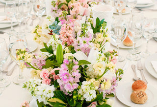 Vibrant wedding flower arrangement featuring colorful fresh cut blooms including stock roses and hydrangeas from Bloomingmore farm-fresh flowers