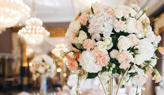summer wedding flower arrangement with Hydrangeas and Roses