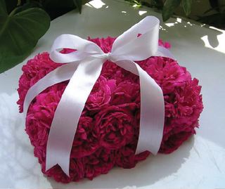 DIY flower box filled with fresh farm-direct roses arranged in tight rows with a ribbon bow, perfect for Mother's Day, proposals, birthdays, and every celebration from Bloomingmore