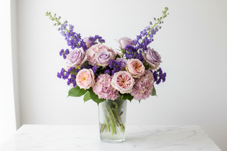 Libra zodiac flowers - lavender roses, Keira garden roses, pink hydrangeas, statice and larkspur bouquet in a vase - farm-fresh flowers by Bloomingmore