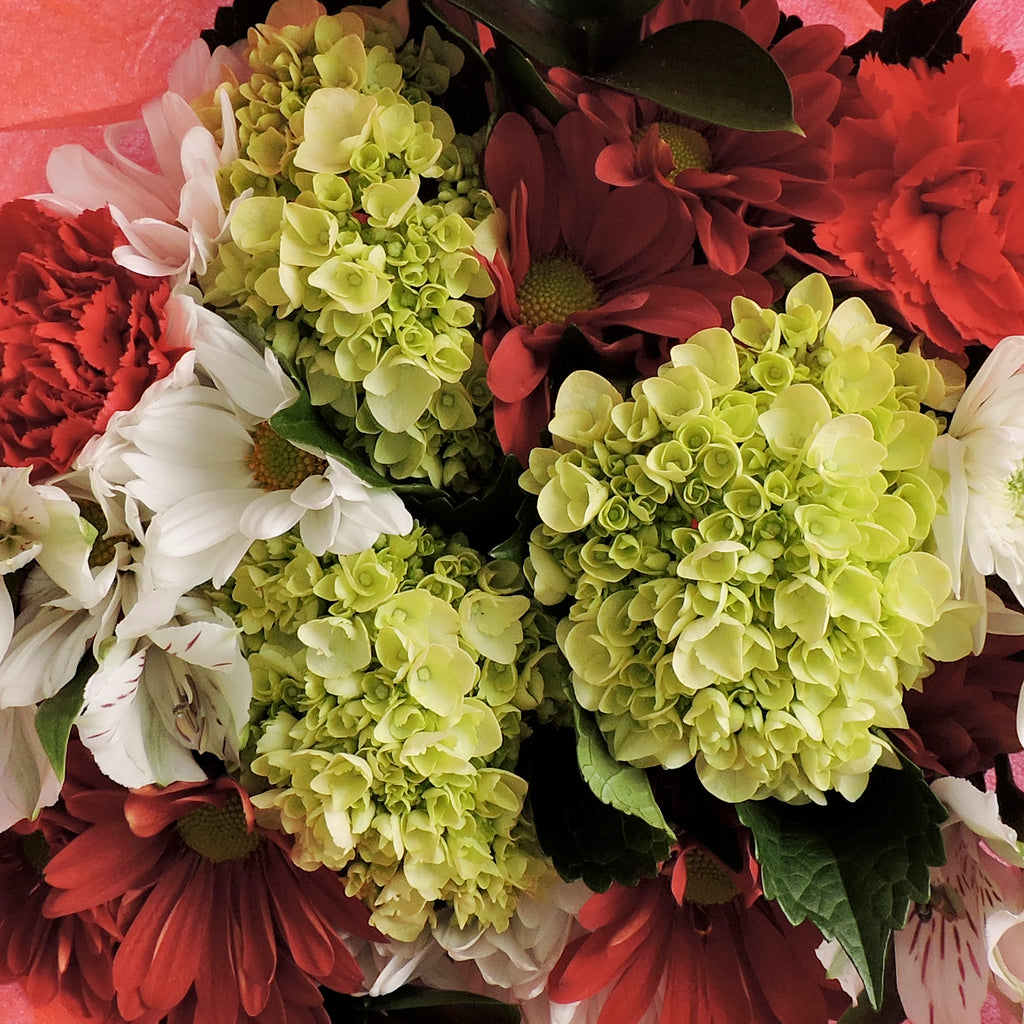 Green, red and white flowers bouquet