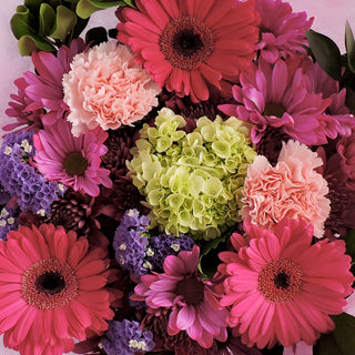 Pink, purple and green flowers bouquet